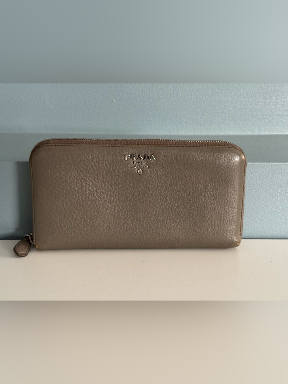 Prada Pebbled Zip-Around Wallet in Taupe Brown